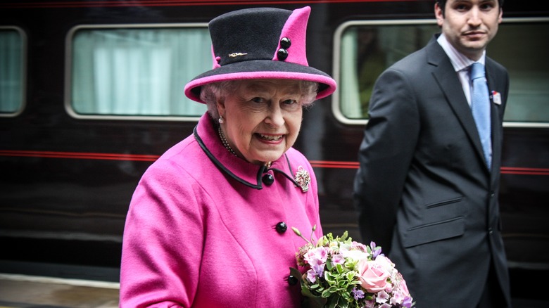 Queen Elizabeth II in a pink coat