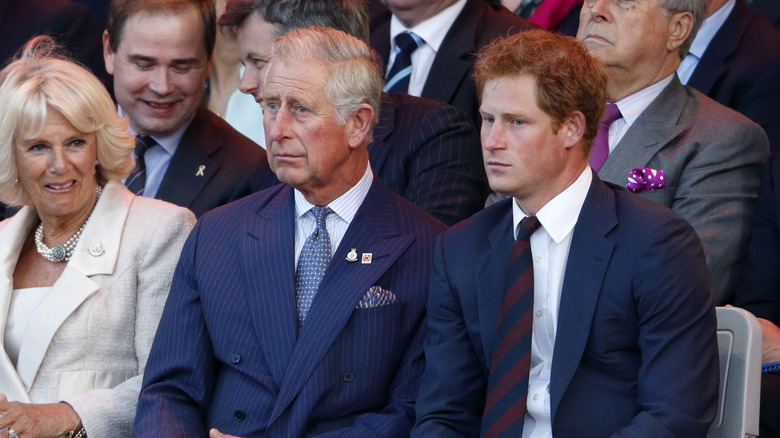 Harry with Charles and Camilla, 2014 