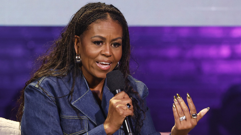 Michelle Obama speaks onstage during the Michelle Obama: The Light We Carry Tour