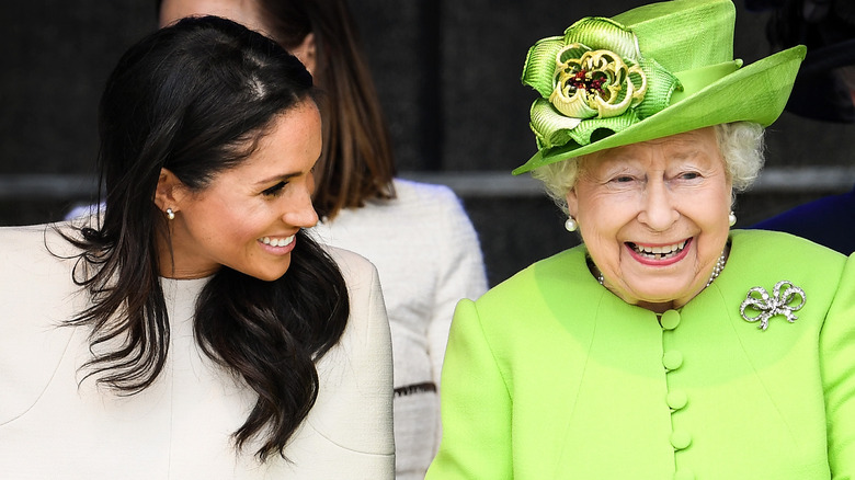 Meghan Markle and Queen Elizabeth II laughing