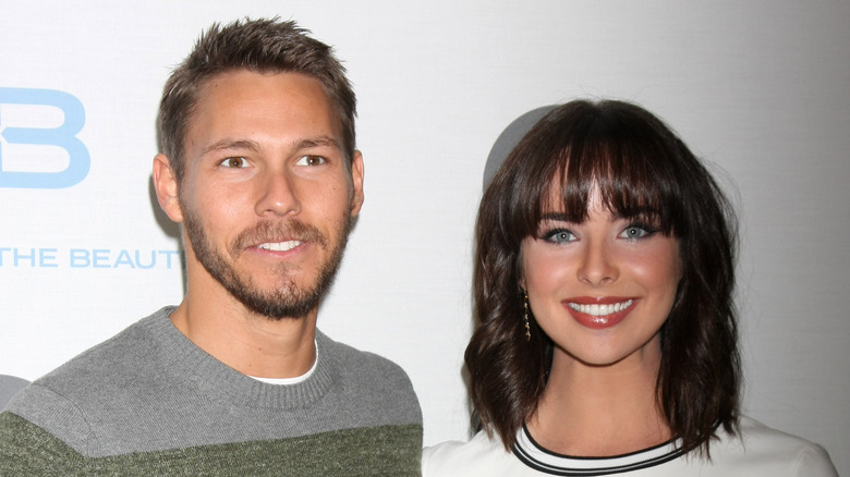 Scott Clifton and Ashleigh Brewer smiling