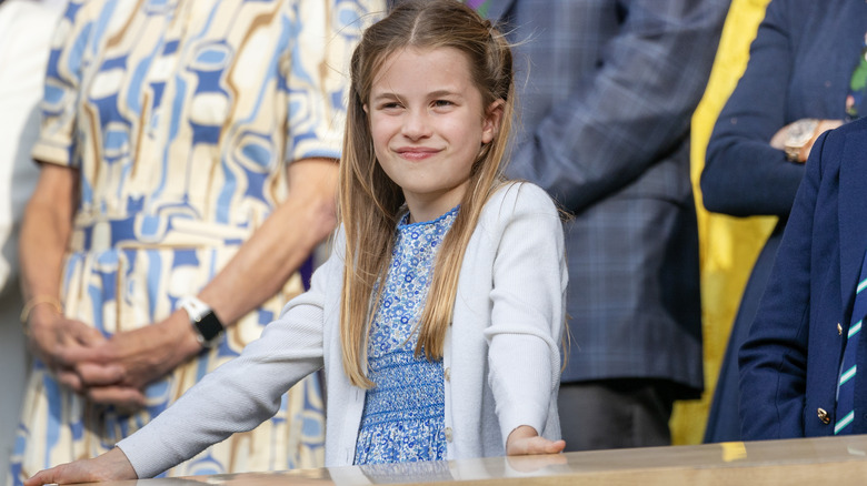 Princess Charlotte leaning on ledge