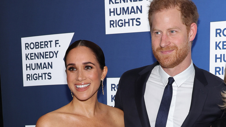 Prince Harry and Meghan Markle attending an event