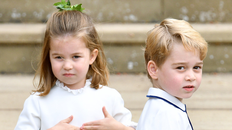 Prince George and Princess Charlotte posing