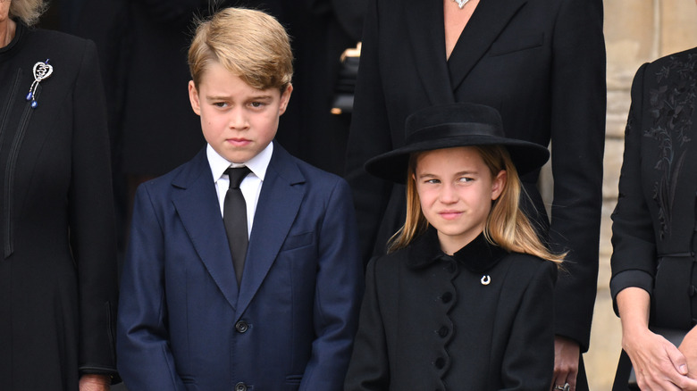 Prince George and Princess Charlotte posing