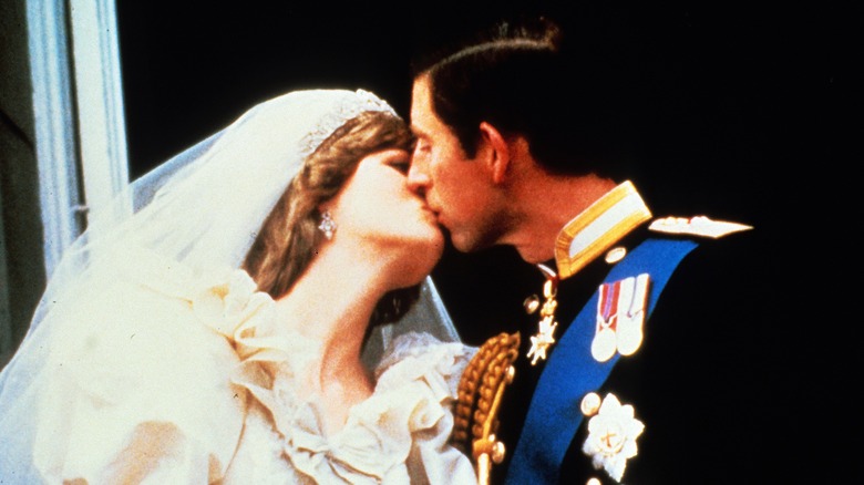 Diana and Charles kissing