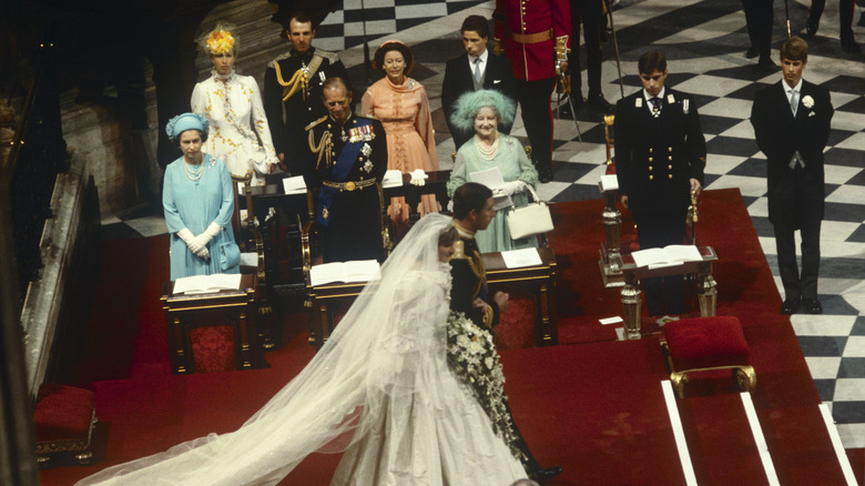 Diana and Charles walking to altar