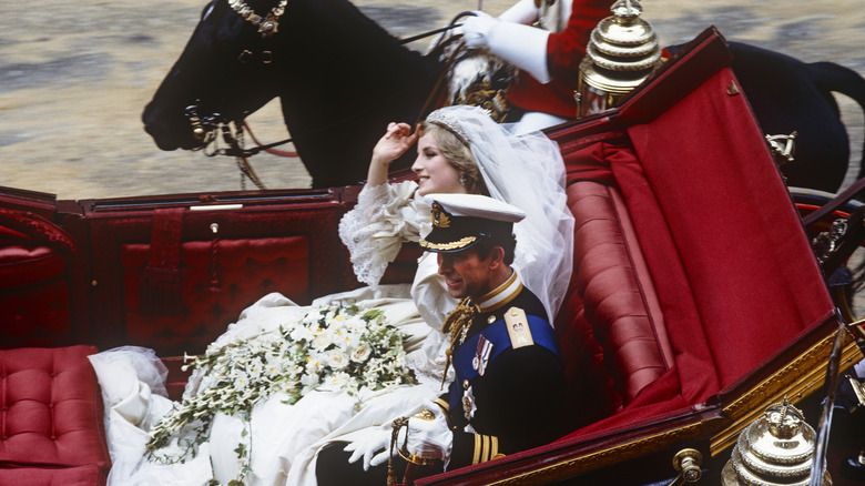 Diana and Charles riding in carriage