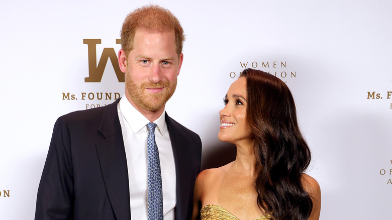 Prince Harry and Meghan Markle posing together