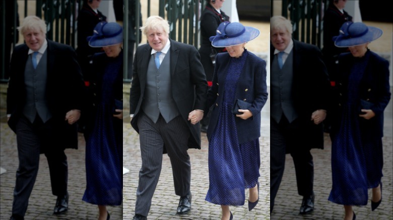 Carrie and Boris Johnson walking at the coronation