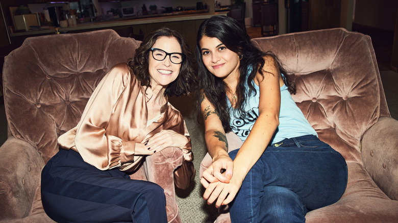 Ally Sheedy and Sofia Black-D'Elia posing on armchairs