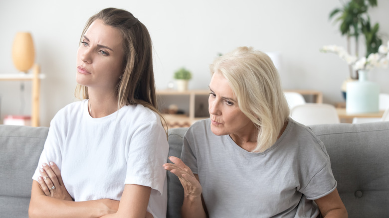 A woman yelling at her daughter