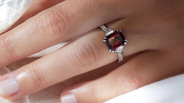 Garnet ring on hand