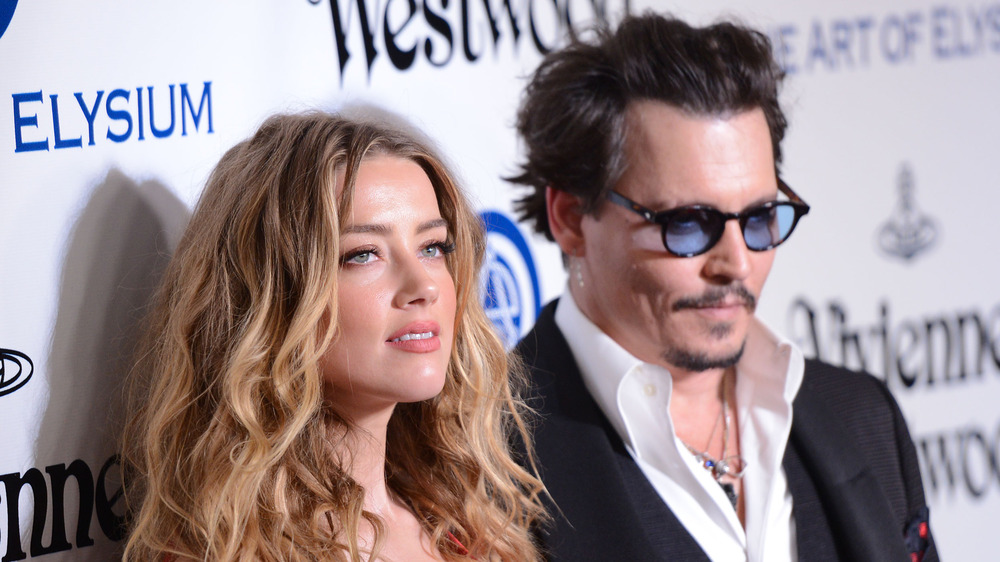 Amber Heard and Johnny Depp at event