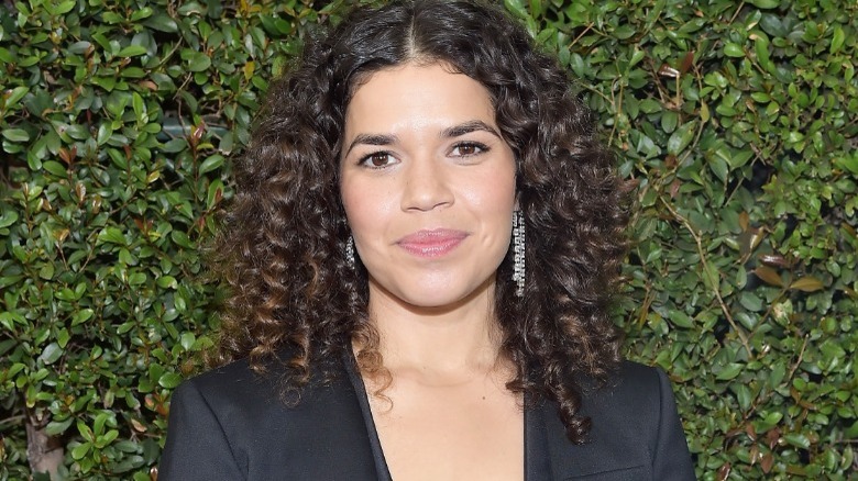 America Ferrera with backdrop of greenery