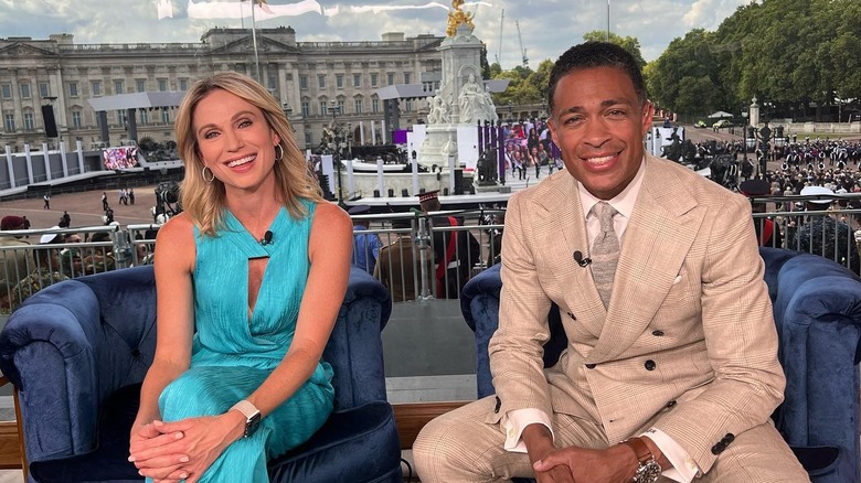 T.J. Holmes and Amy Robach smile