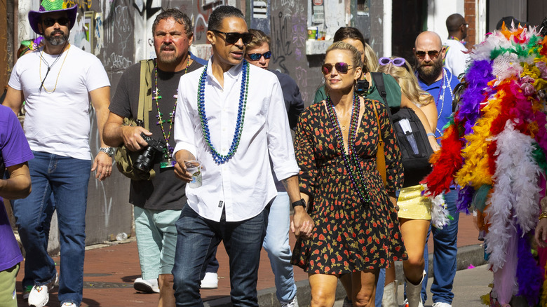 T.J. Holmes and Amy Robach holding hands in public