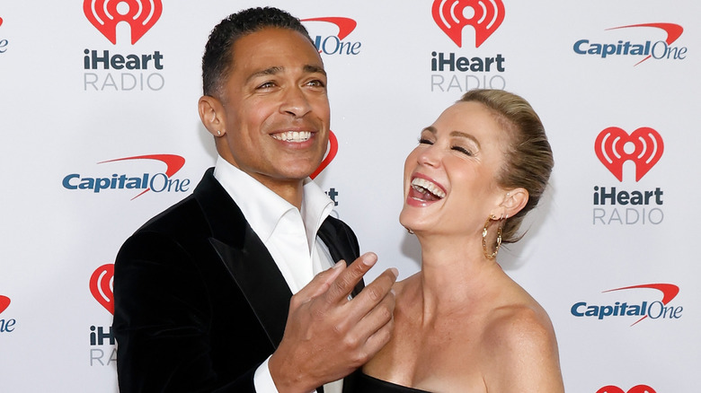 T.J. HOlmes and Amy Robach laughing