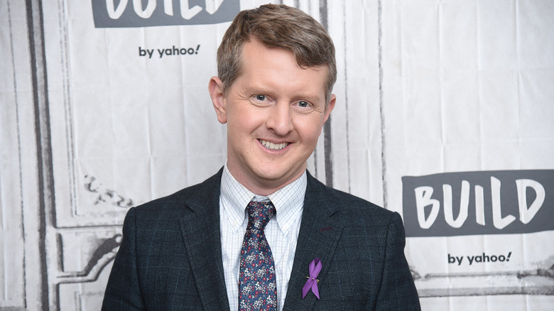 Ken Jennings smiles at an event