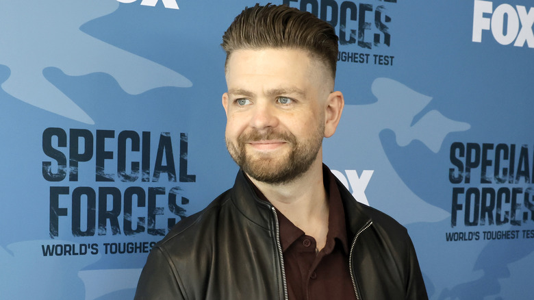 Jack Osbourne smiling on the red carpet