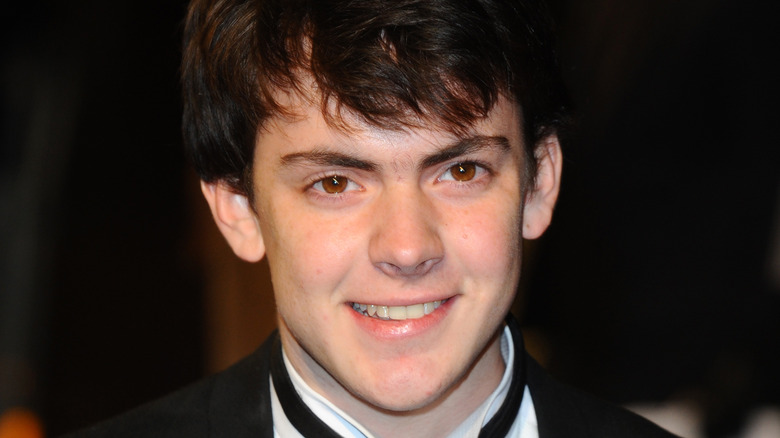 Skandar Keynes smiling