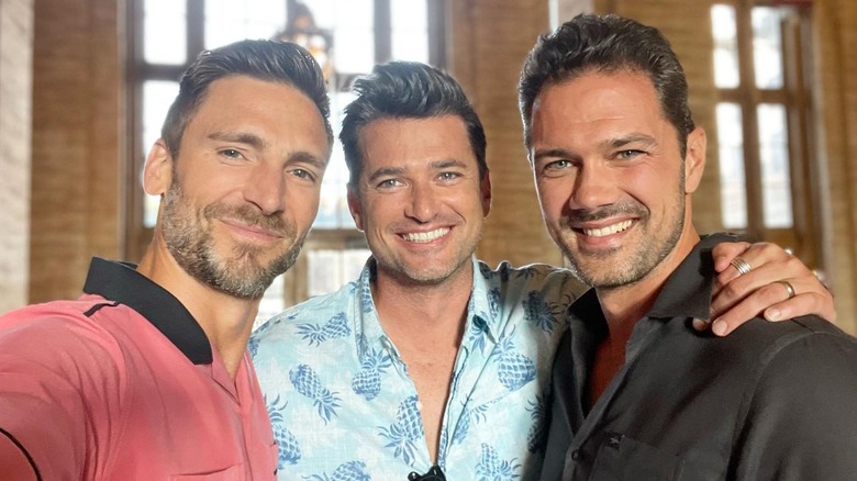 Andrew Walker taking a selfie with fellow Hallmark stars Wes Brown and Ryan Paevey