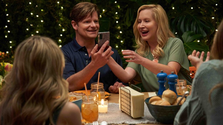 (Center L-R) Steve Zahn and Angela Kinsey smiling in Tall Girl 2