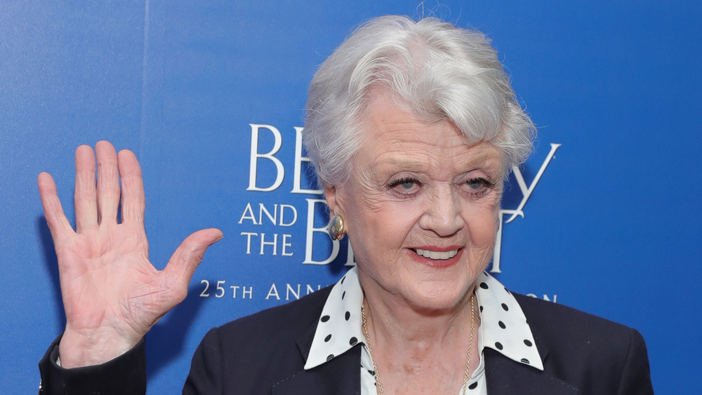 Angela Lansbury waving on red carpet