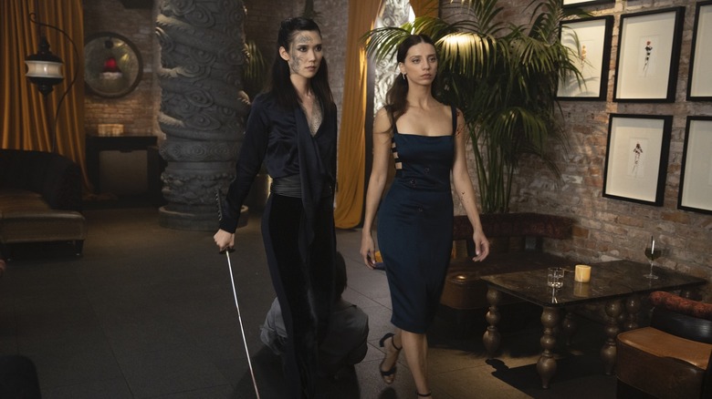 Tao Okamoto and Angela Sarafyan walking together of "Westworld"