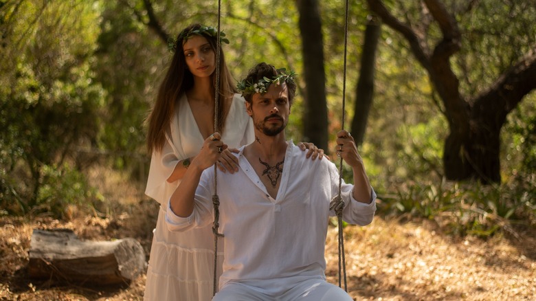 Angela Sarafyan as Willow and Matthew Gray Gubler as Thorn on a swing in "King Knight"