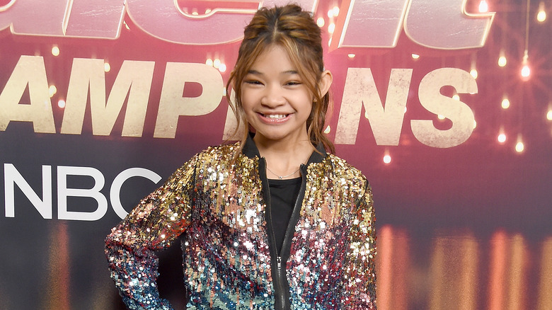 Angelica Hale smiling on the red carpet