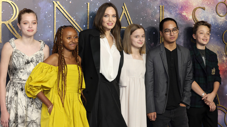 Angelina Jolie posing for photos with her kids