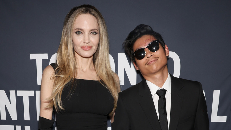 Angelina Jolie smiling with her son