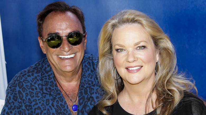 Leann Hunley and Thaao Penghlis pose for a photo.