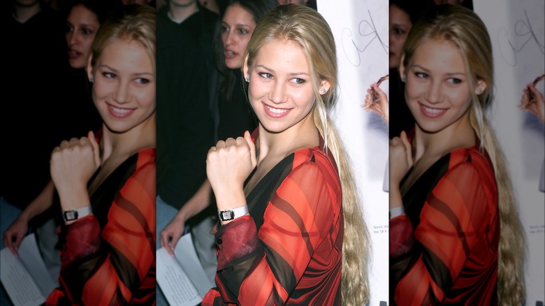 Anna Kournikova showing off an Omega watch