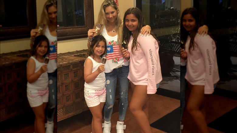 Anna Kournikova eating ice cream with two girls