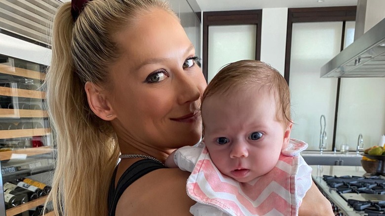 Anna Kournikova holding Mary