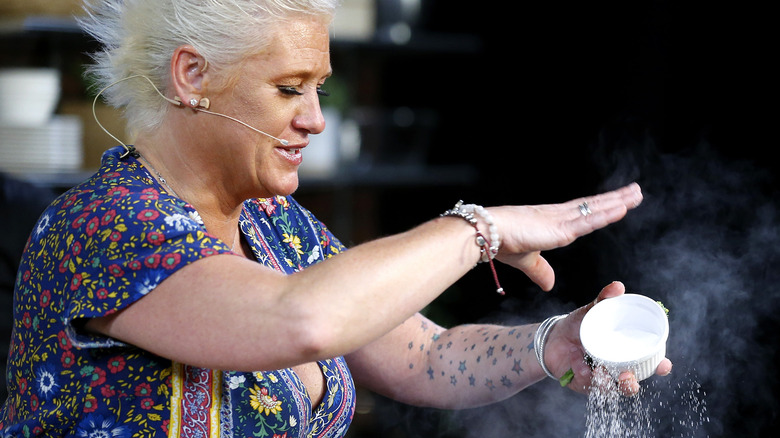 Anne Burrell sprinkling salt