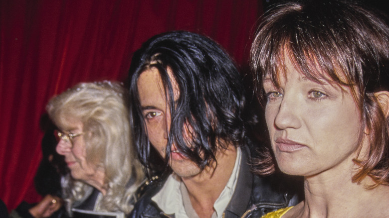 Johnny Depp and Ellen Barkin attend an event together