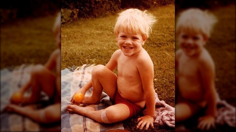 Young Ant Anstead sitting, smiling