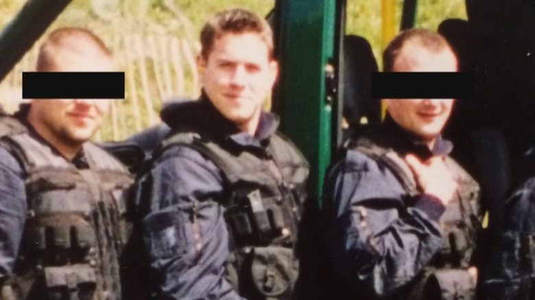 Ant Anstead standing with cops