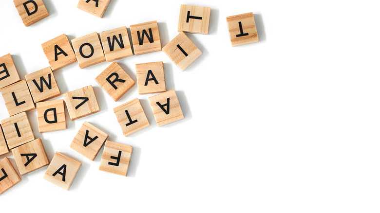 Scrabble tiles on white background