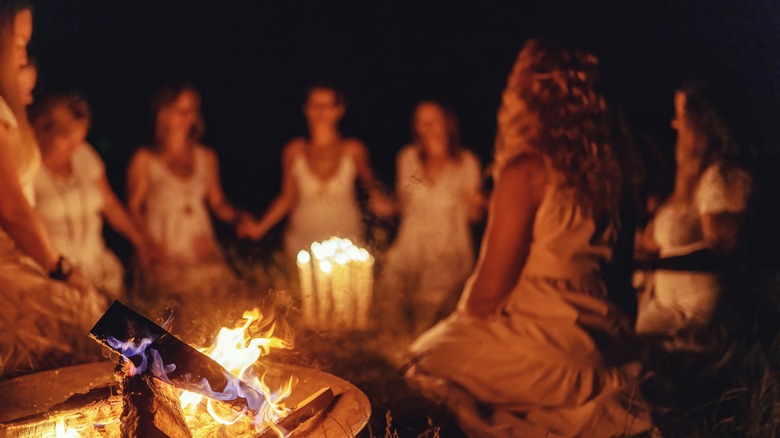 women around a fire