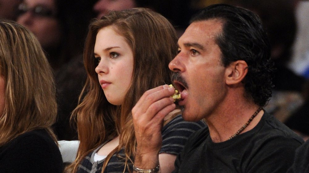 Antonio Banderas' daughter Stella with her father at a game