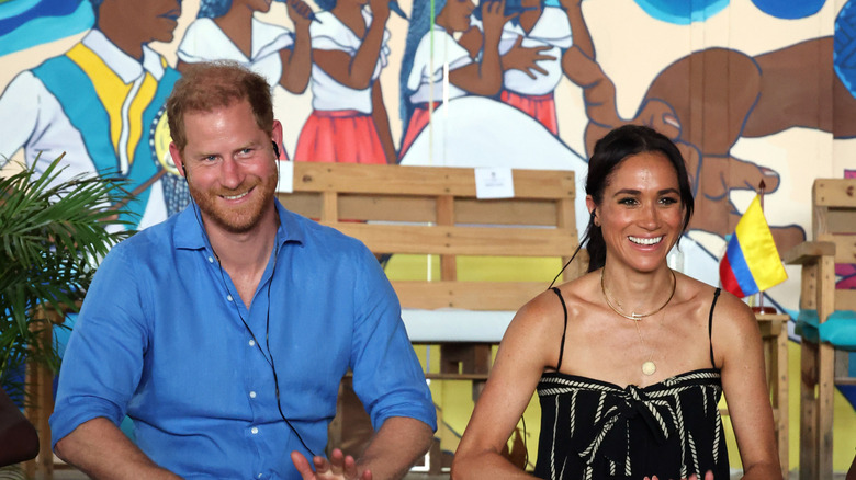 Prince Harry and Meghan smiling