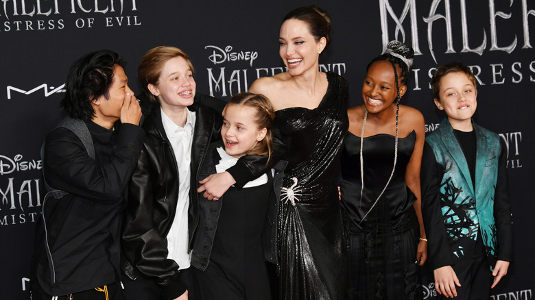 Angelina Jolie and her children laughing at the Maleficent premiere