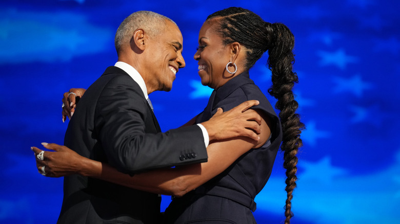 Michelle and Barack Obama hugging