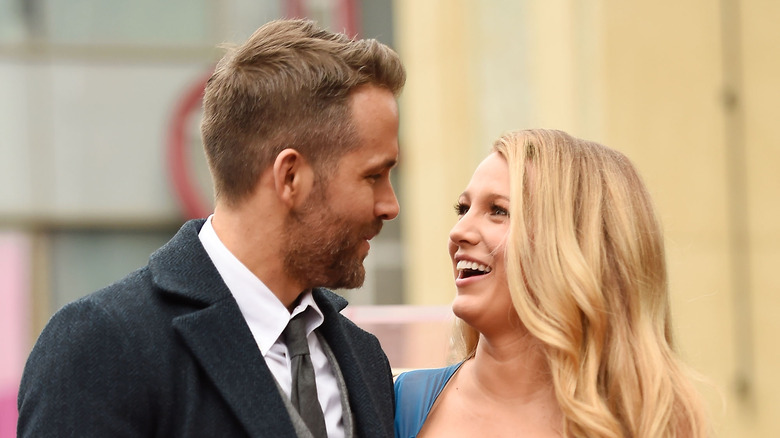 Blake Lively and Ryan Reynolds at an event. 