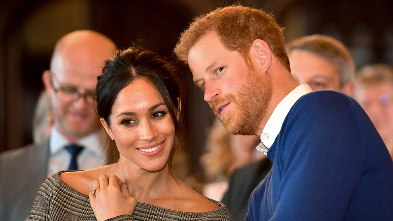 Meghan and Harry confer