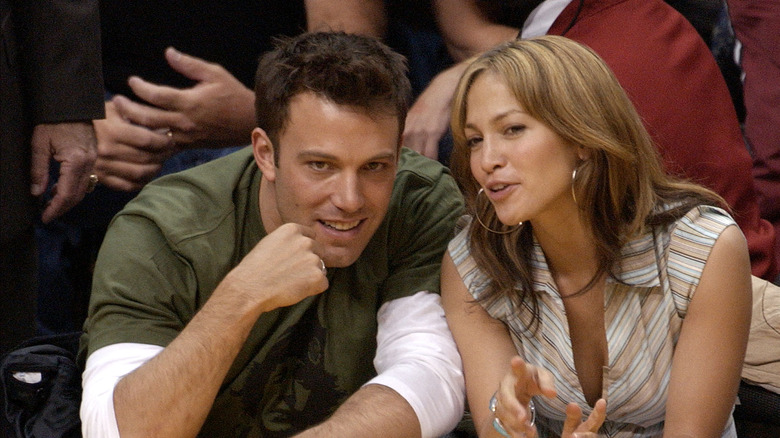 Jennifer Lopez and Ben Affleck at a basketball game. 